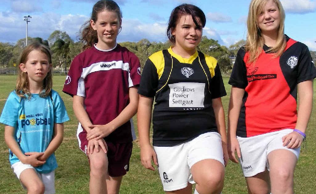 Madison Kane (7 years), Ashleigh Kane (11), Bree Shields (13) and Sheri Payne (16) will play junior football this season. Madison Kane (7 years), Ashleigh Kane (11), Bree Shields (13) and Sheri Payne (16) will play junior football this season.
